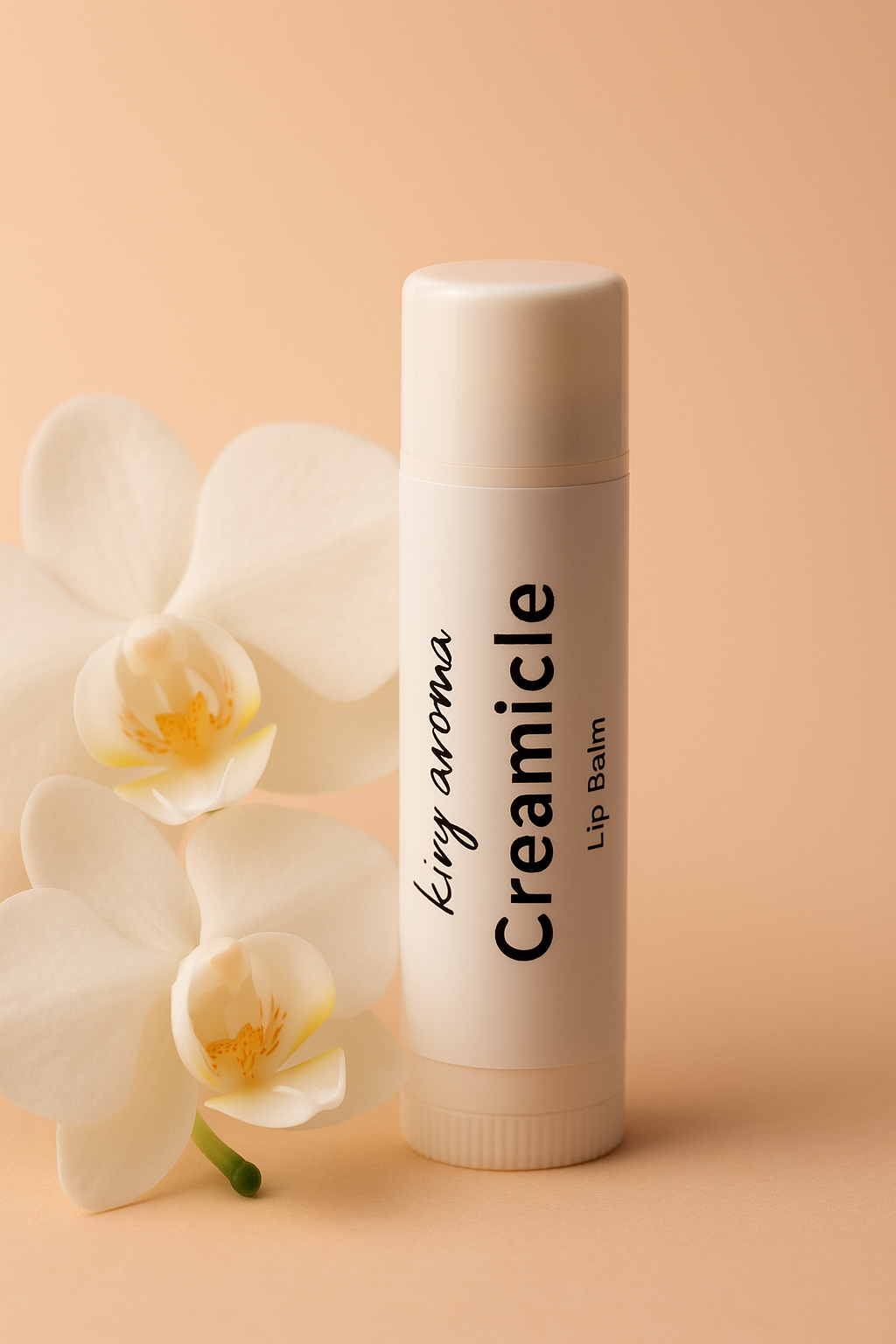 Creamicle lip balm with a white orchid on a beige background, kiry aroma.