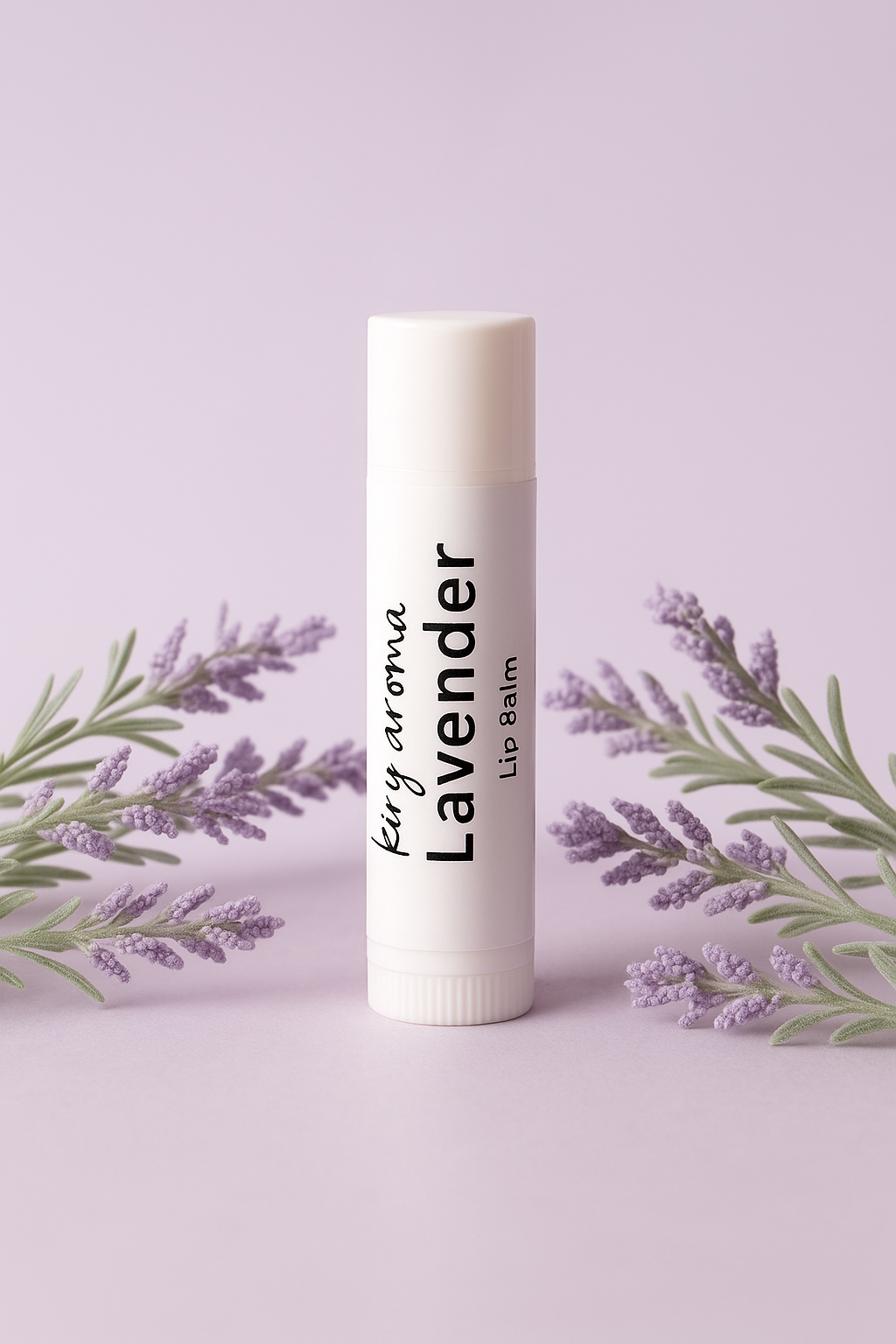 Lavender lip balm with lavender leaves on a light purple background